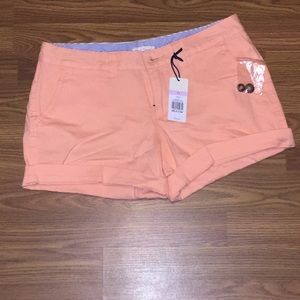Jean shorts, brand new, in a peach color, size 11
